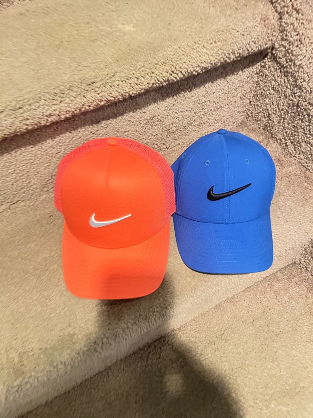 Two Nike Nike adult unisex Caps - Bright Orange and royal blue for the one cost